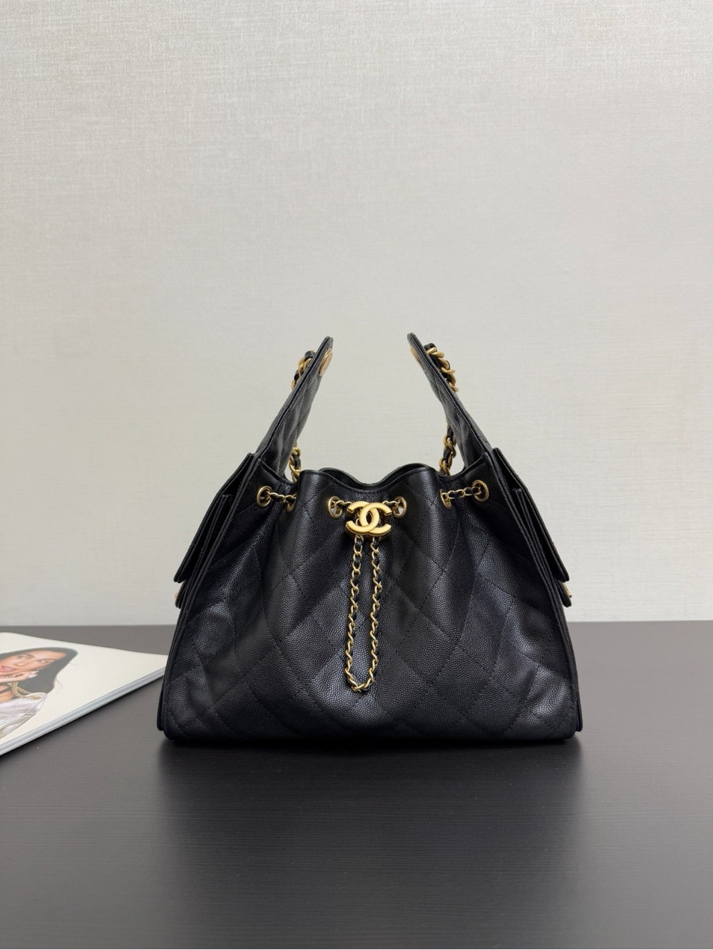 Black Quilted Drawstring Bucket Bag with Gold CC Chain